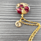 Rosenblüten Epoxidharz Halskette personalisiert Blättchen Buchstabe personalized gold Schmuck romantisch rosepetals romantic rose petals Rosen Blattgold Geschenkidee rund necklace